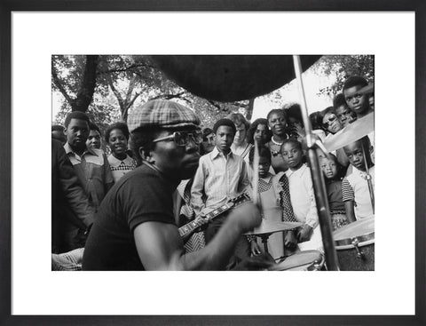 Band playing music to crowd at fun fair, Brent Cross 1973