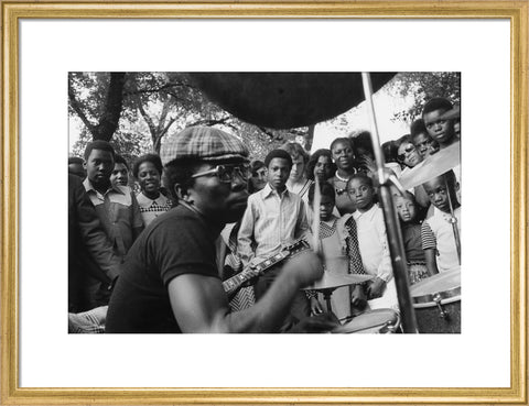 Band playing music to crowd at fun fair, Brent Cross 1973
