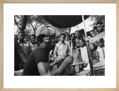 Band playing music to crowd at fun fair, Brent Cross 1973