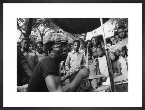 Band playing music to crowd at fun fair, Brent Cross 1973