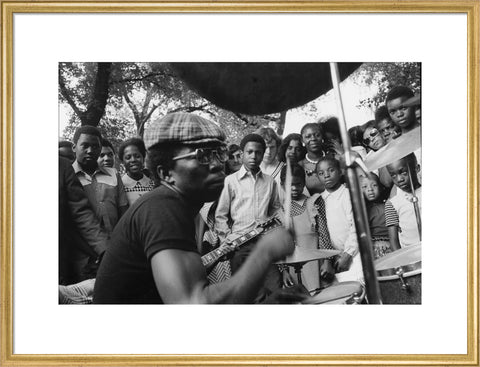Band playing music to crowd at fun fair, Brent Cross 1973