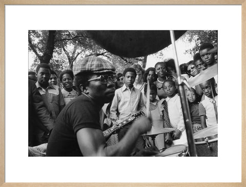 Band playing music to crowd at fun fair, Brent Cross 1973