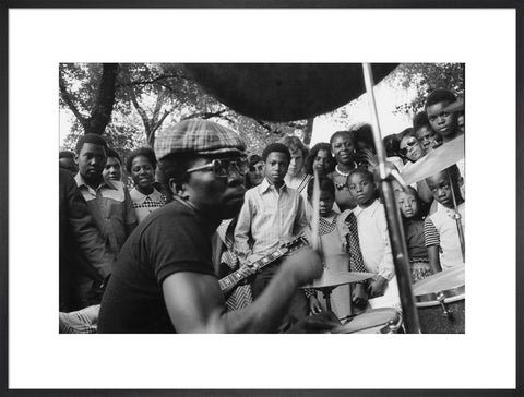 Band playing music to crowd at fun fair, Brent Cross 1973