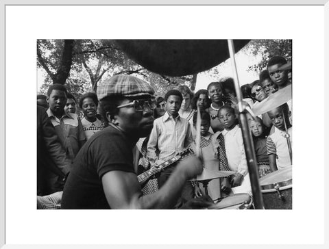 Band playing music to crowd at fun fair, Brent Cross 1973