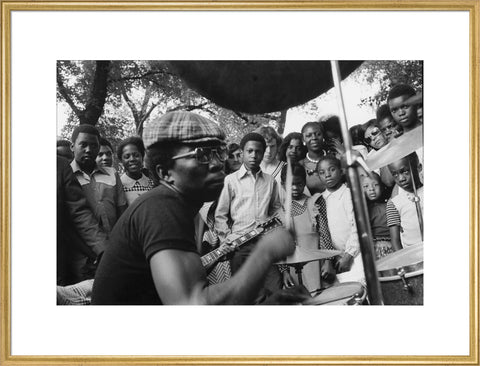 Band playing music to crowd at fun fair, Brent Cross 1973