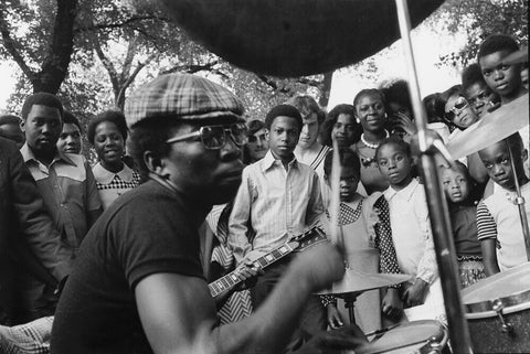 Band playing music to crowd at fun fair, Brent Cross 1973