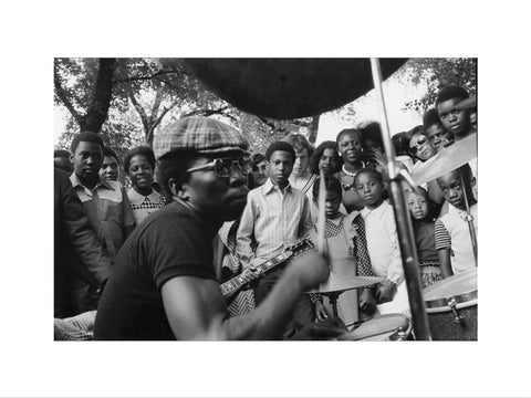 Band playing music to crowd at fun fair, Brent Cross 1973