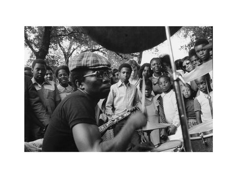 Band playing music to crowd at fun fair, Brent Cross 1973