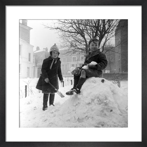 Two children play in the snow, Hampstead