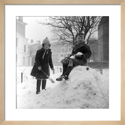 Two children play in the snow, Hampstead