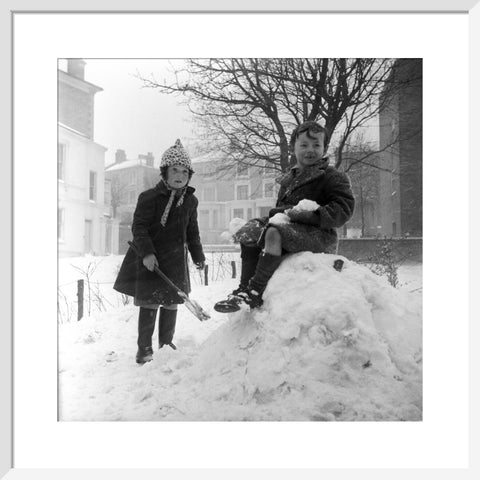 Two children play in the snow, Hampstead