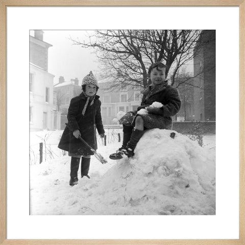 Two children play in the snow, Hampstead