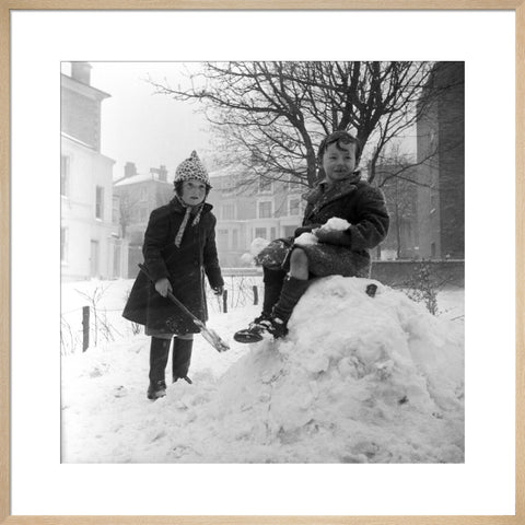 Two children play in the snow, Hampstead