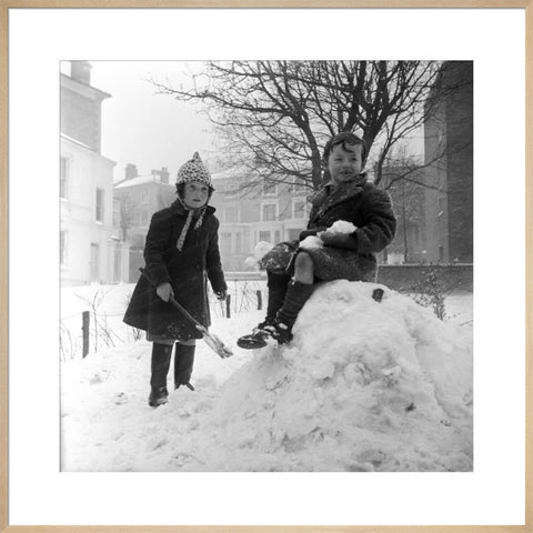 Two children play in the snow, Hampstead