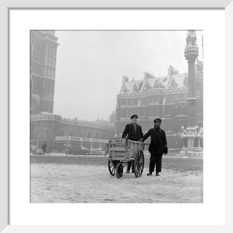 Newspaper sellers in the snow in Westminster