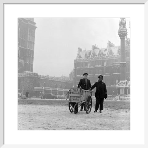 Newspaper sellers in the snow in Westminster