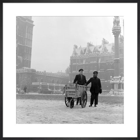Newspaper sellers in the snow in Westminster
