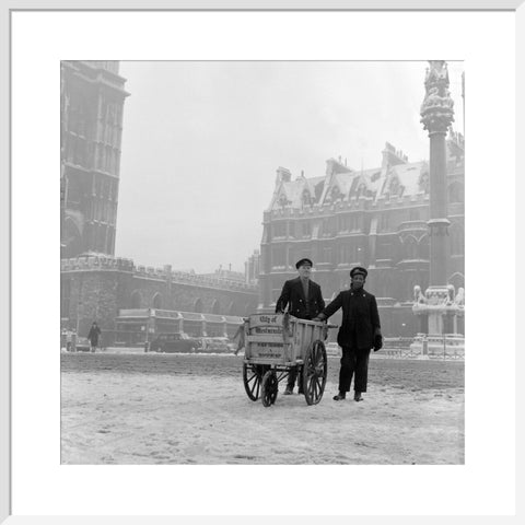 Newspaper sellers in the snow in Westminster