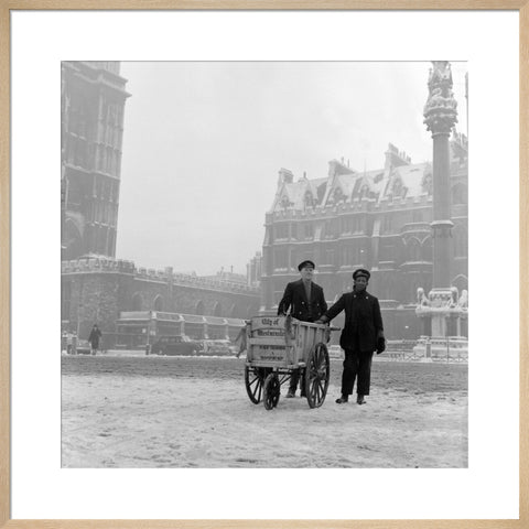 Newspaper sellers in the snow in Westminster