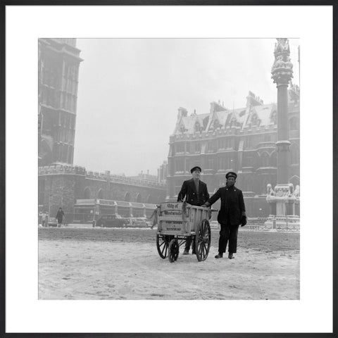 Newspaper sellers in the snow in Westminster