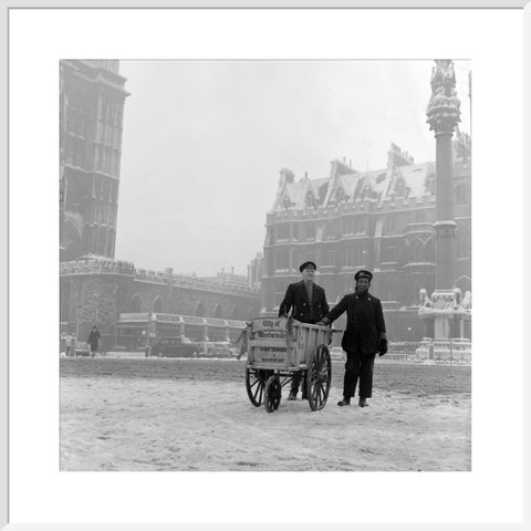 Newspaper sellers in the snow in Westminster