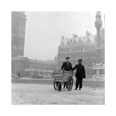 Newspaper sellers in the snow in Westminster