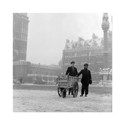 Newspaper sellers in the snow in Westminster