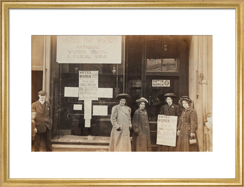 Photographic postcard of leading Suffragettes standing outside a branch shop of the Women's Social and Political Union in Hawick Scotland.