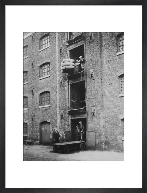 West India Docks 1900 Sugar being hoisted into warehouses