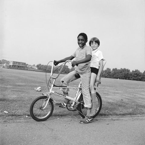 Two boys riding a bicycle 1973