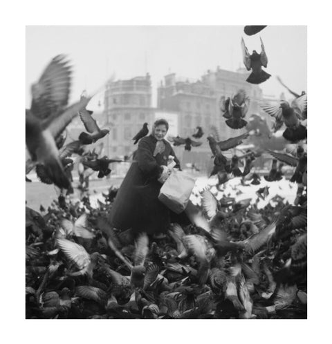 Feeding the pigeons in Trafalgar Square 20th century