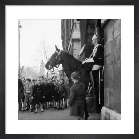 Children watch the horse guards 1960