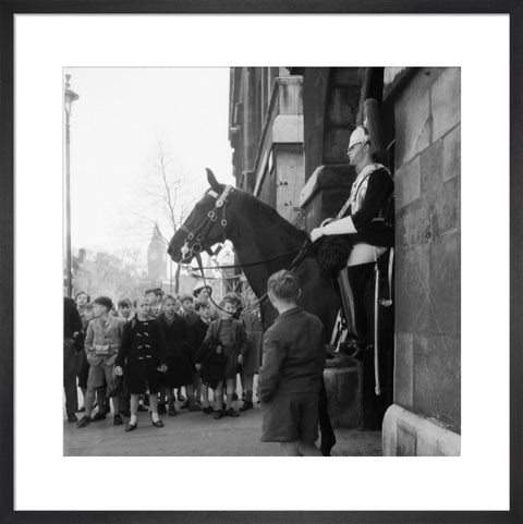 Children watch the horse guards 1960