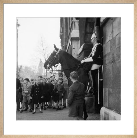 Children watch the horse guards 1960