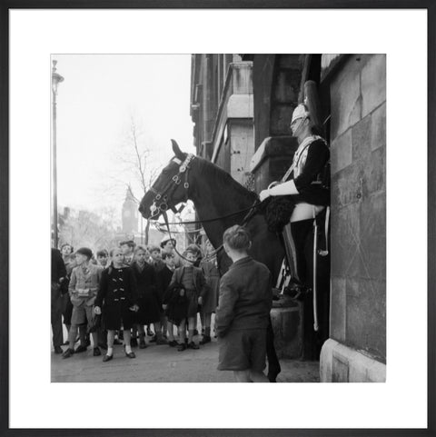 Children watch the horse guards 1960