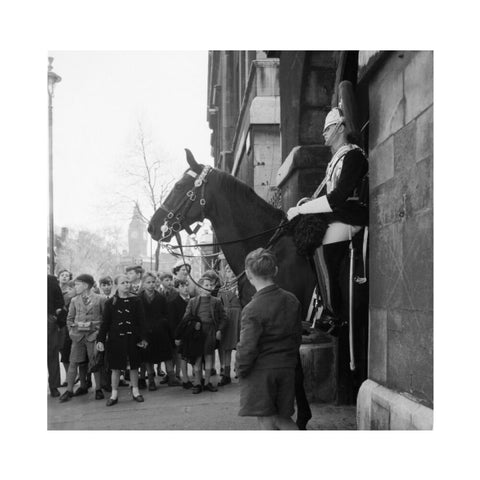 Children watch the horse guards 1960