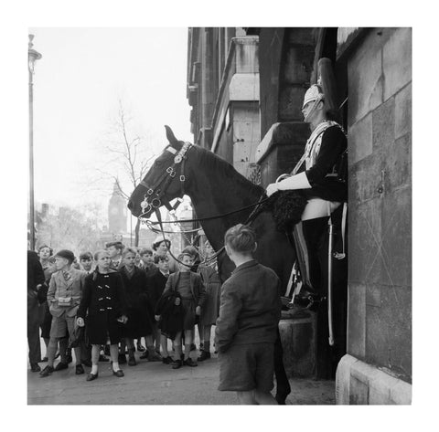 Children watch the horse guards 1960