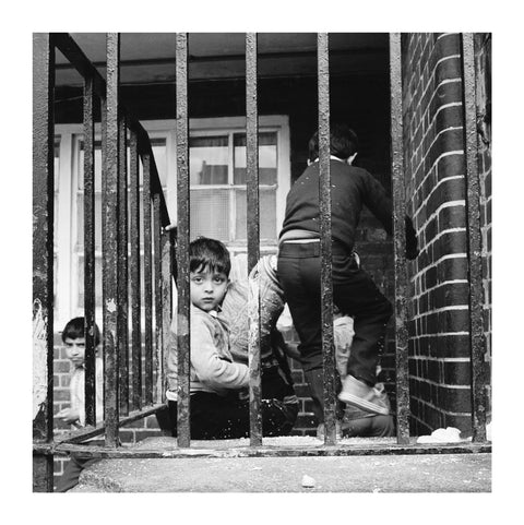 Children play outside their homes near Brick Lane 1983