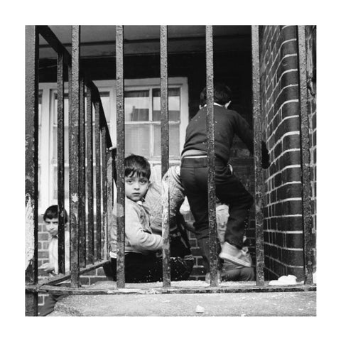 Children play outside their homes near Brick Lane 1983