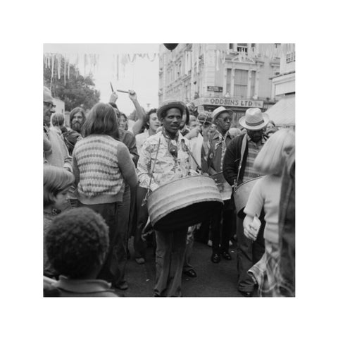 A steel drum player in a local festival at Belsize Park 1975