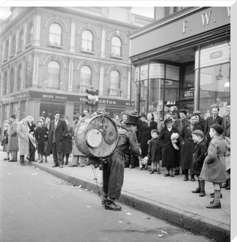 A one-man band in Camden High Street 1952