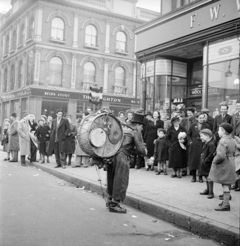 A one-man band in Camden High Street 1952