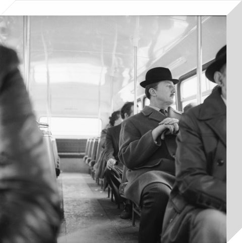 A City gent on the top deck of a London bus 20th century