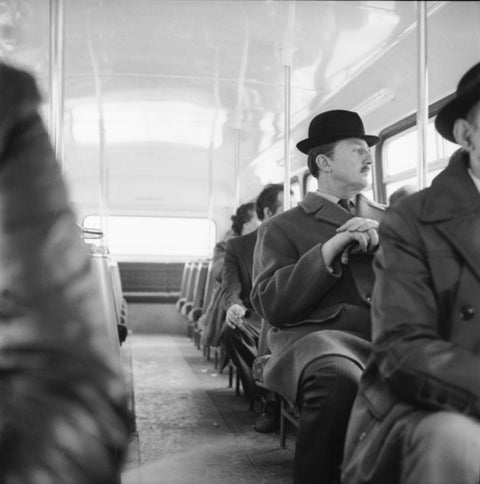 A City gent on the top deck of a London bus 20th century