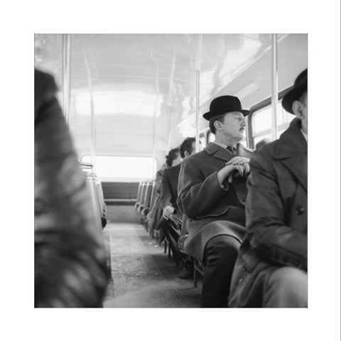 A City gent on the top deck of a London bus 20th century