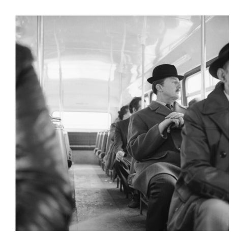 A City gent on the top deck of a London bus 20th century