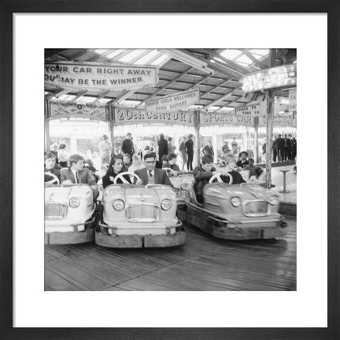 Couples on the dodgems ride Battersea Park fun fair 1966