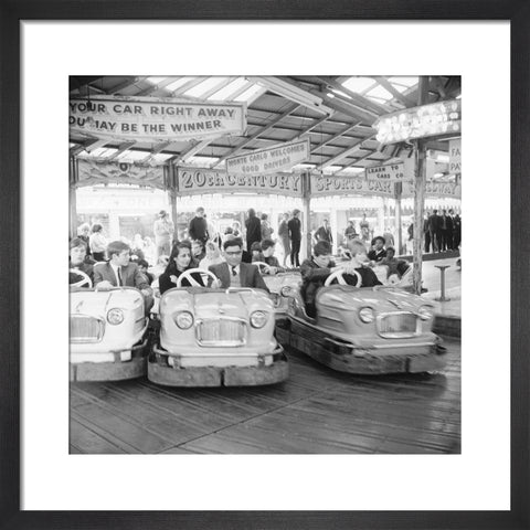 Couples on the dodgems ride Battersea Park fun fair 1966