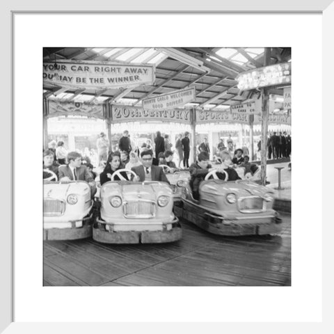 Couples on the dodgems ride Battersea Park fun fair 1966