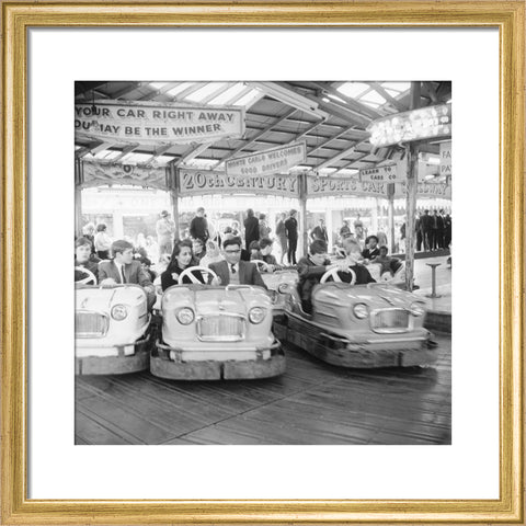 Couples on the dodgems ride Battersea Park fun fair 1966